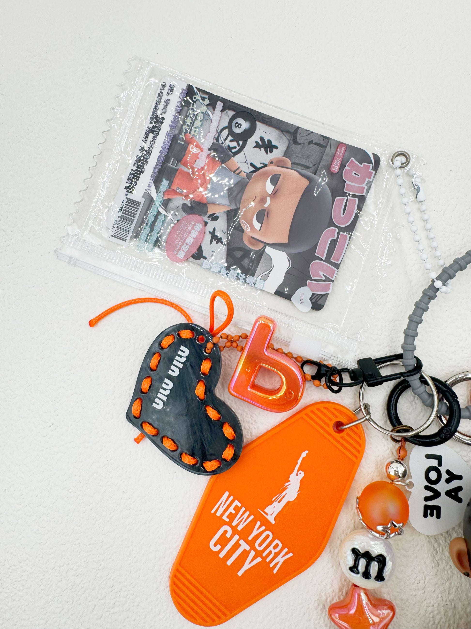 Handmade Kubo beaded bag charm and keychain rhinestone accents
