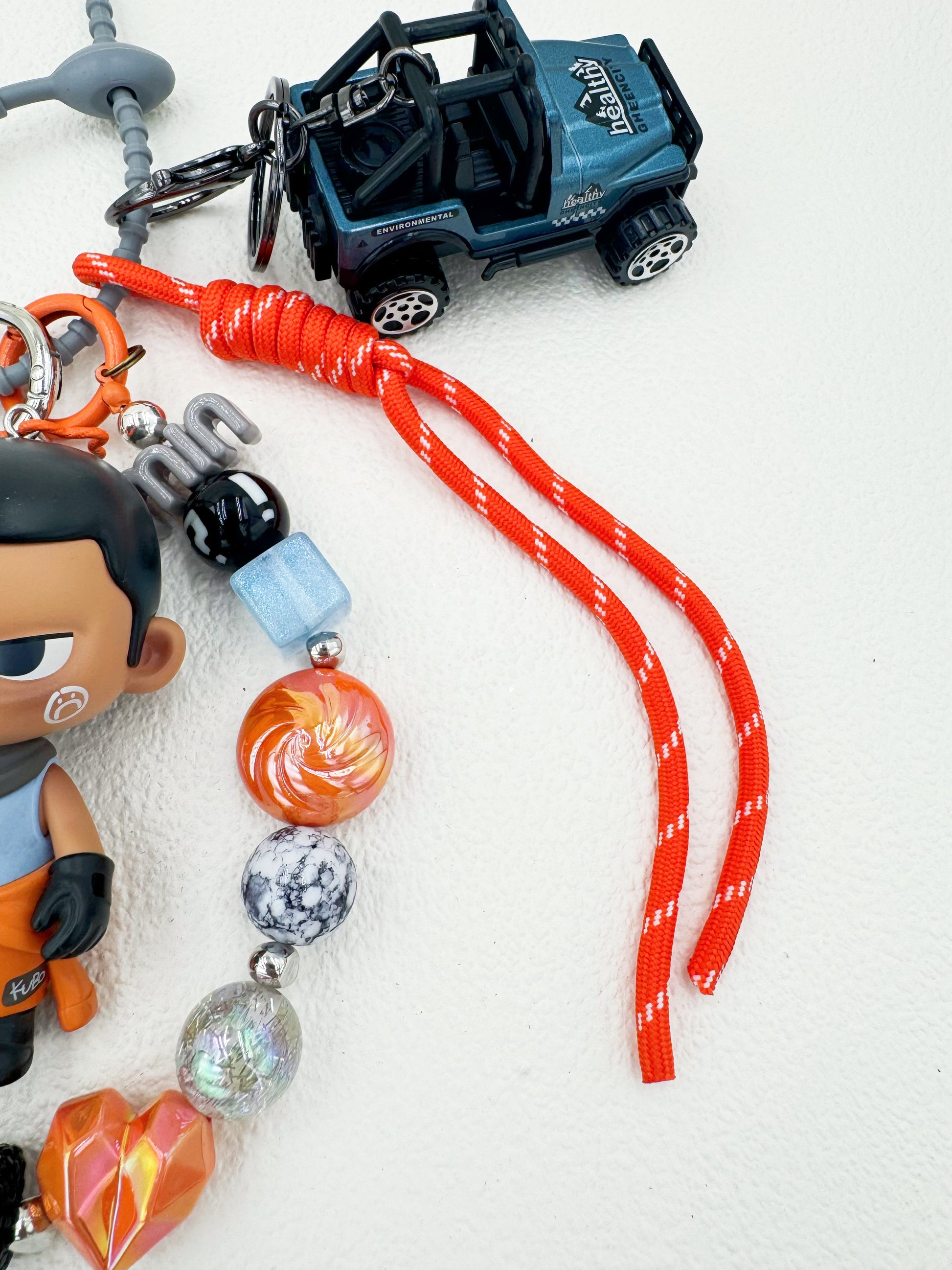Handmade Kubo beaded bag charm and keychain rhinestone accents