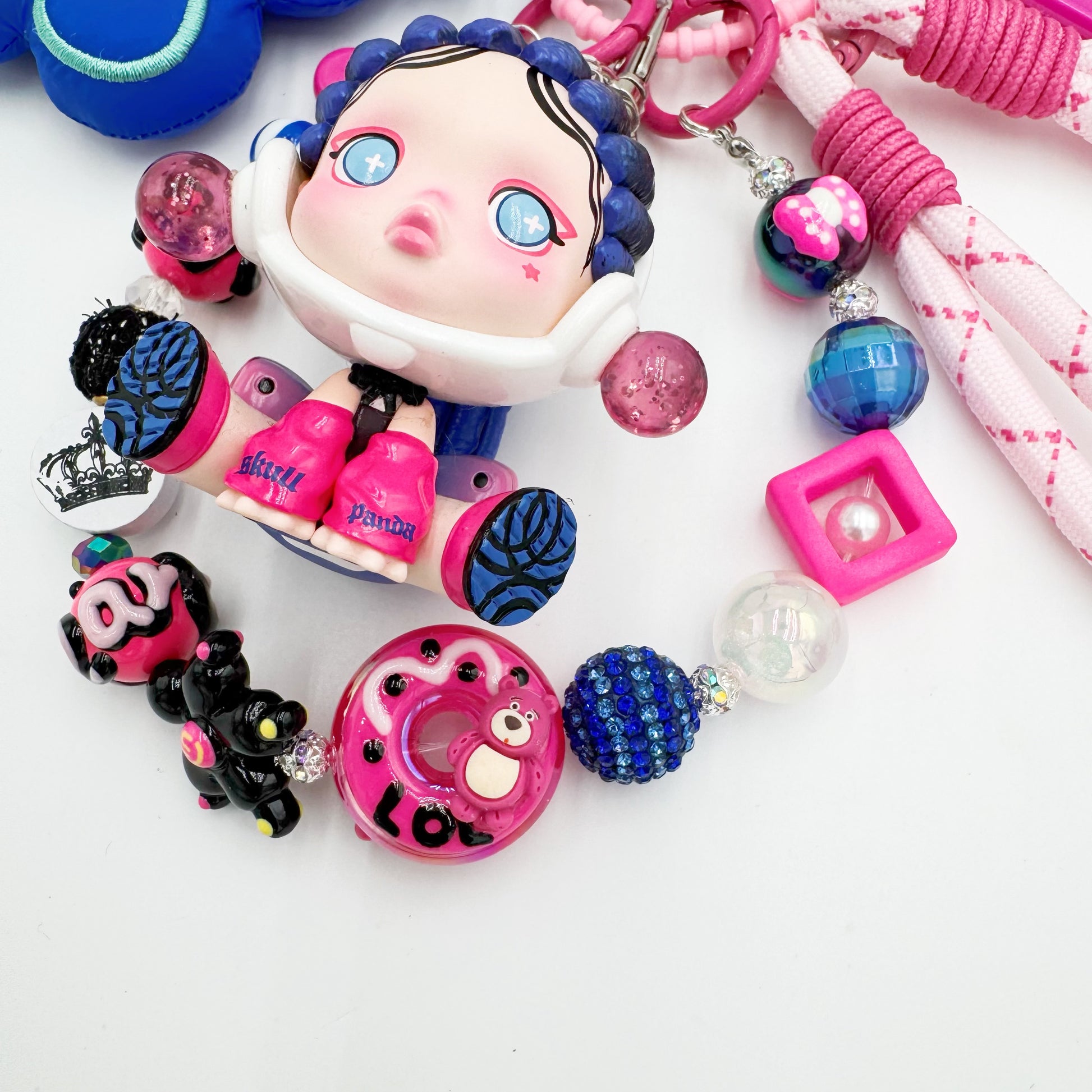Authentic handmade Skullpanda beaded bag charm and keychain rhinestone accents