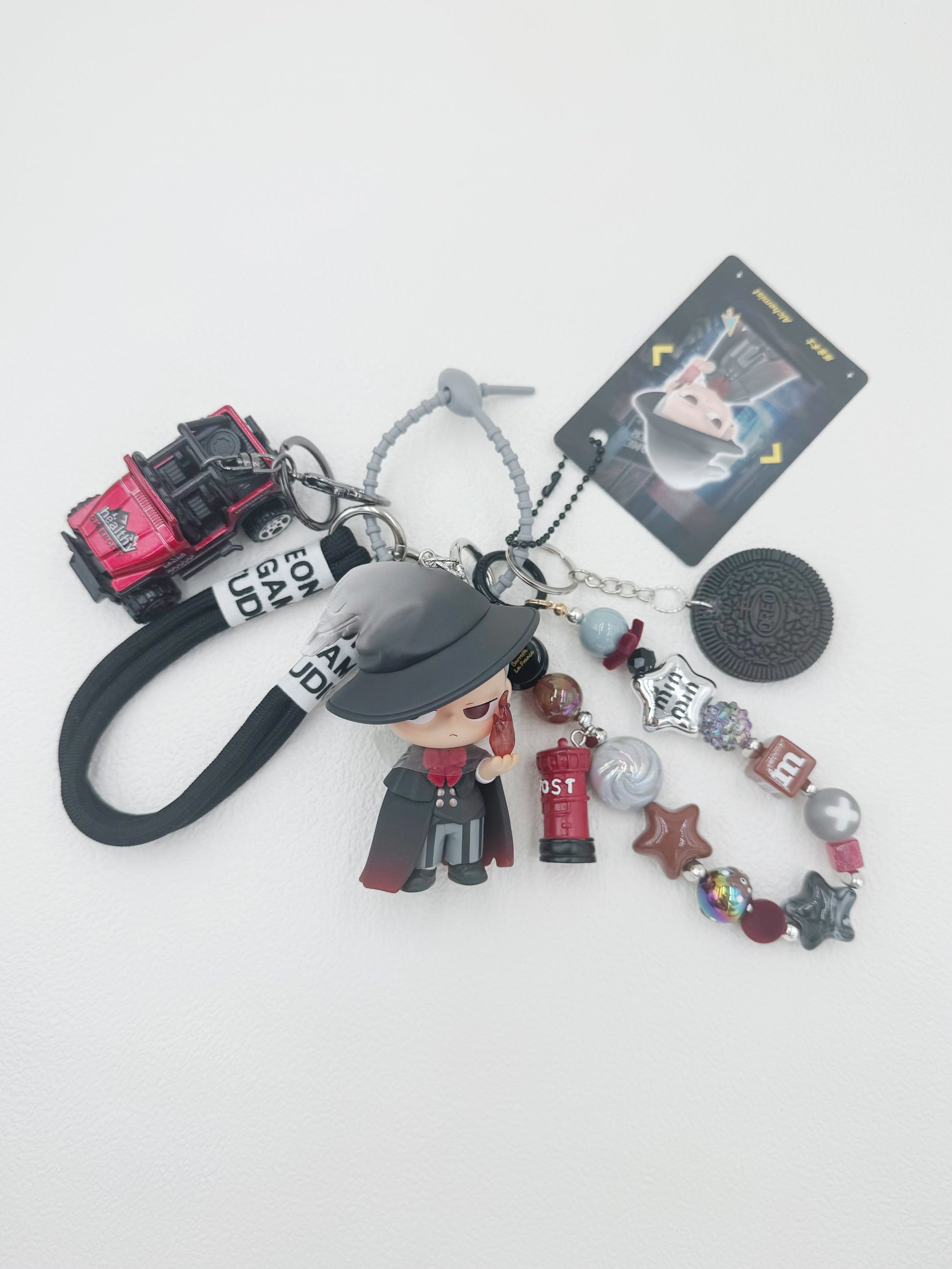 Handmade Kubo beaded bag charm and keychain rhinestone accents