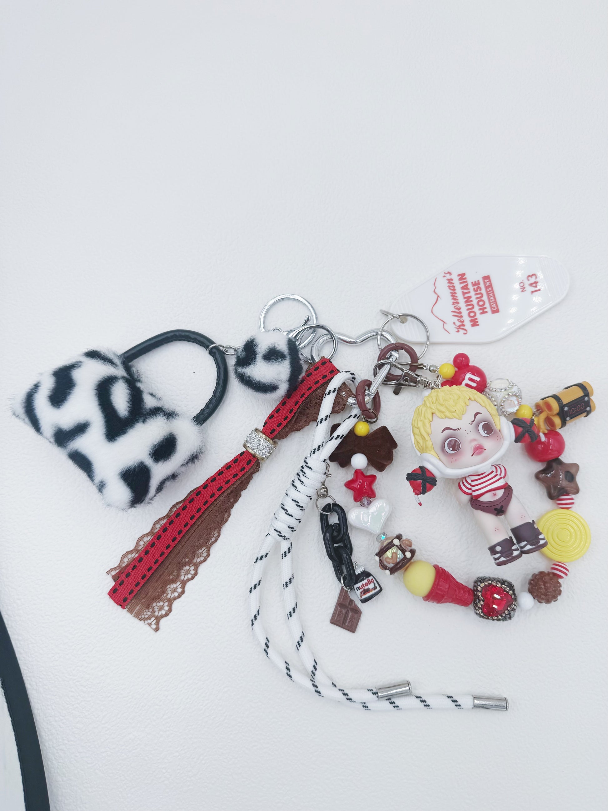 Handmade Skullpanda beaded bag charm and keychain rhinestone accents