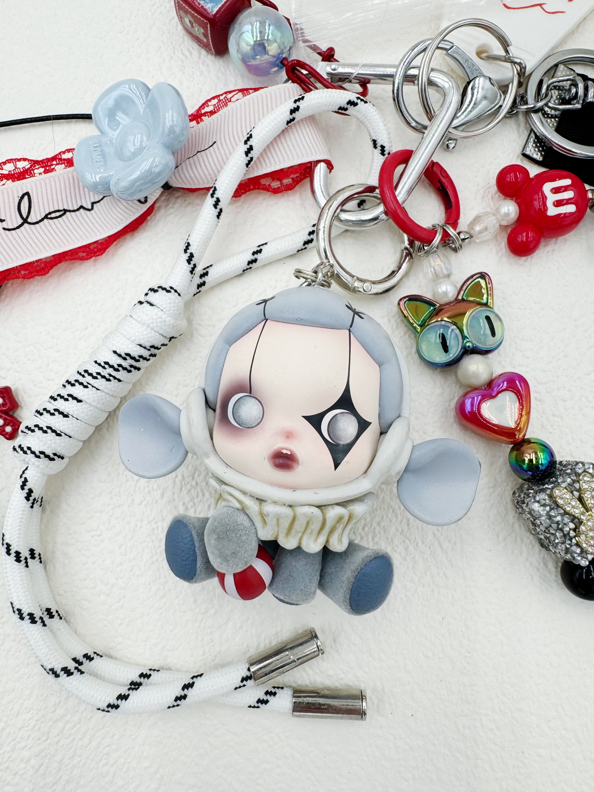 Handmade Skullpanda beaded bag charm and keychain rhinestone accents