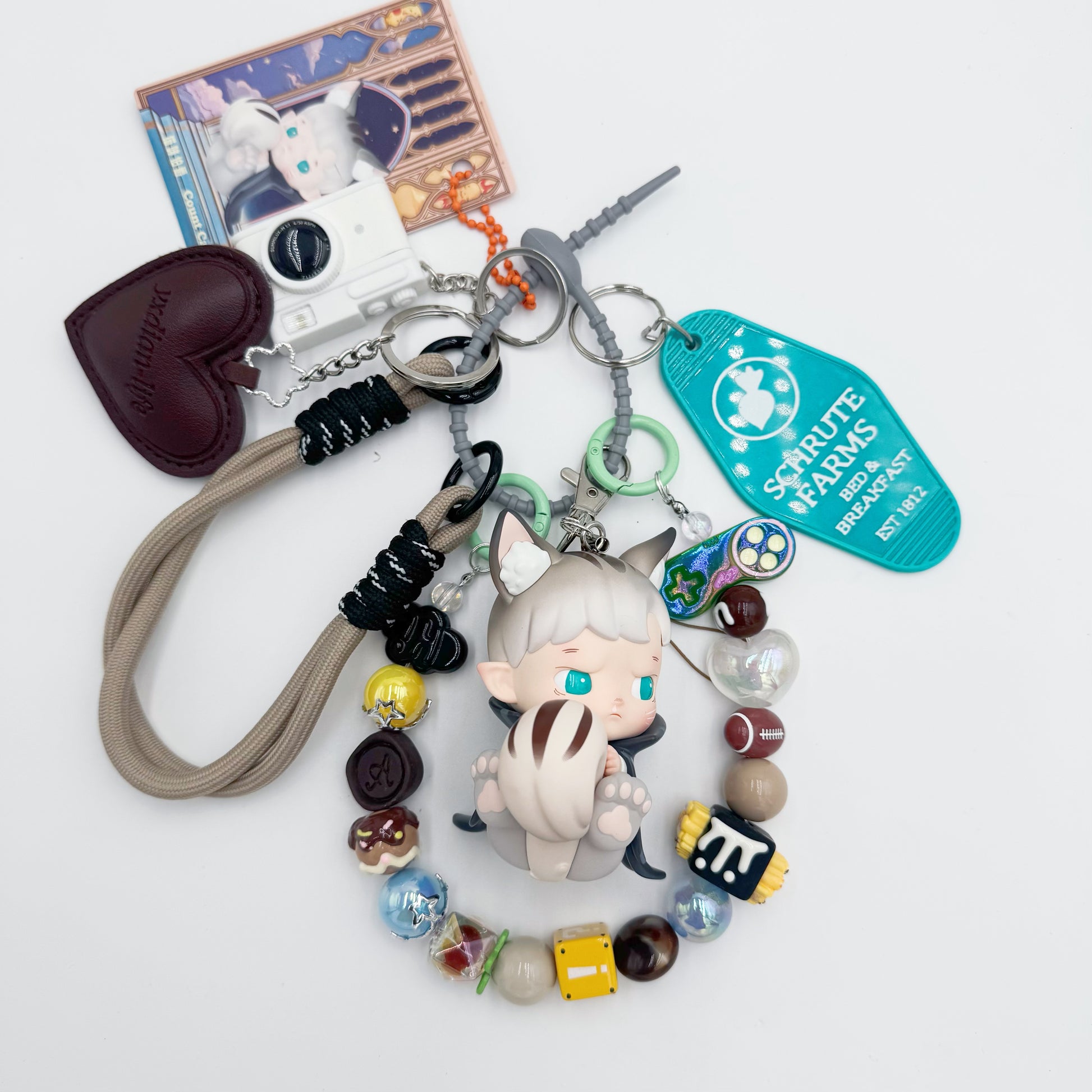 Authentic handmade Hacipupu beaded bag charm and keychain rhinestone accents