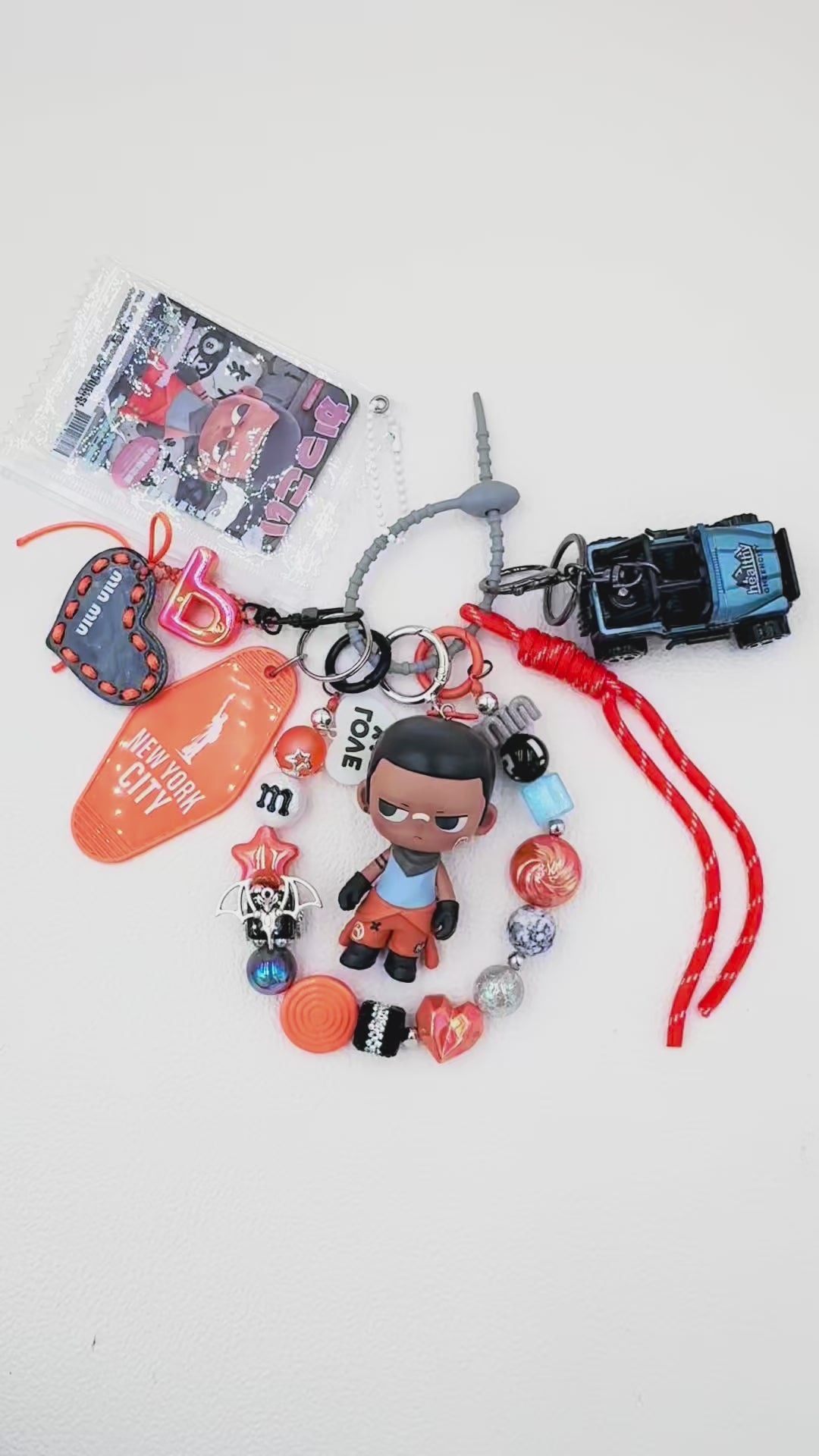 Handmade Kubo beaded bag charm and keychain rhinestone accents