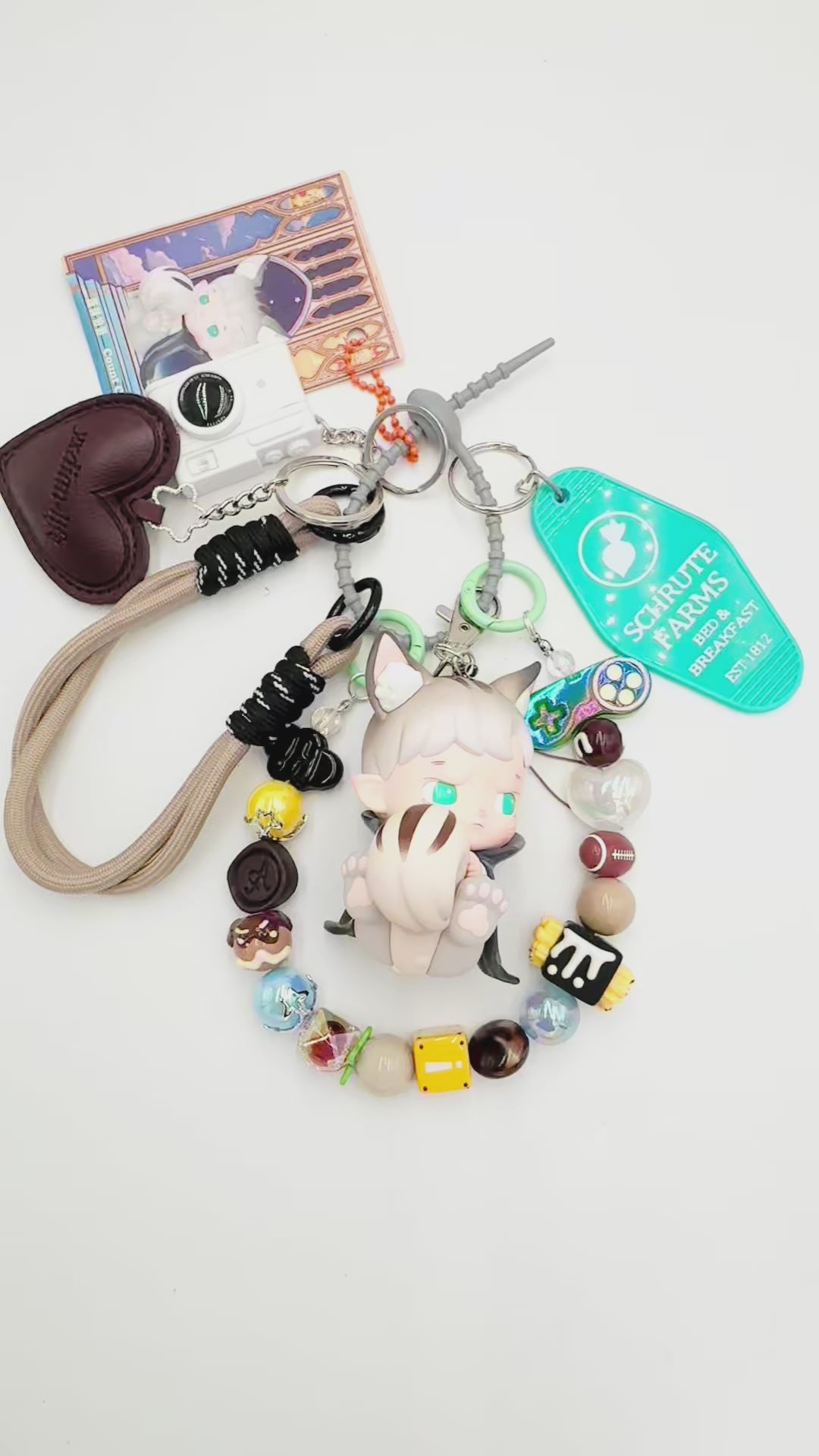 Authentic handmade Hacipupu beaded bag charm and keychain rhinestone accents